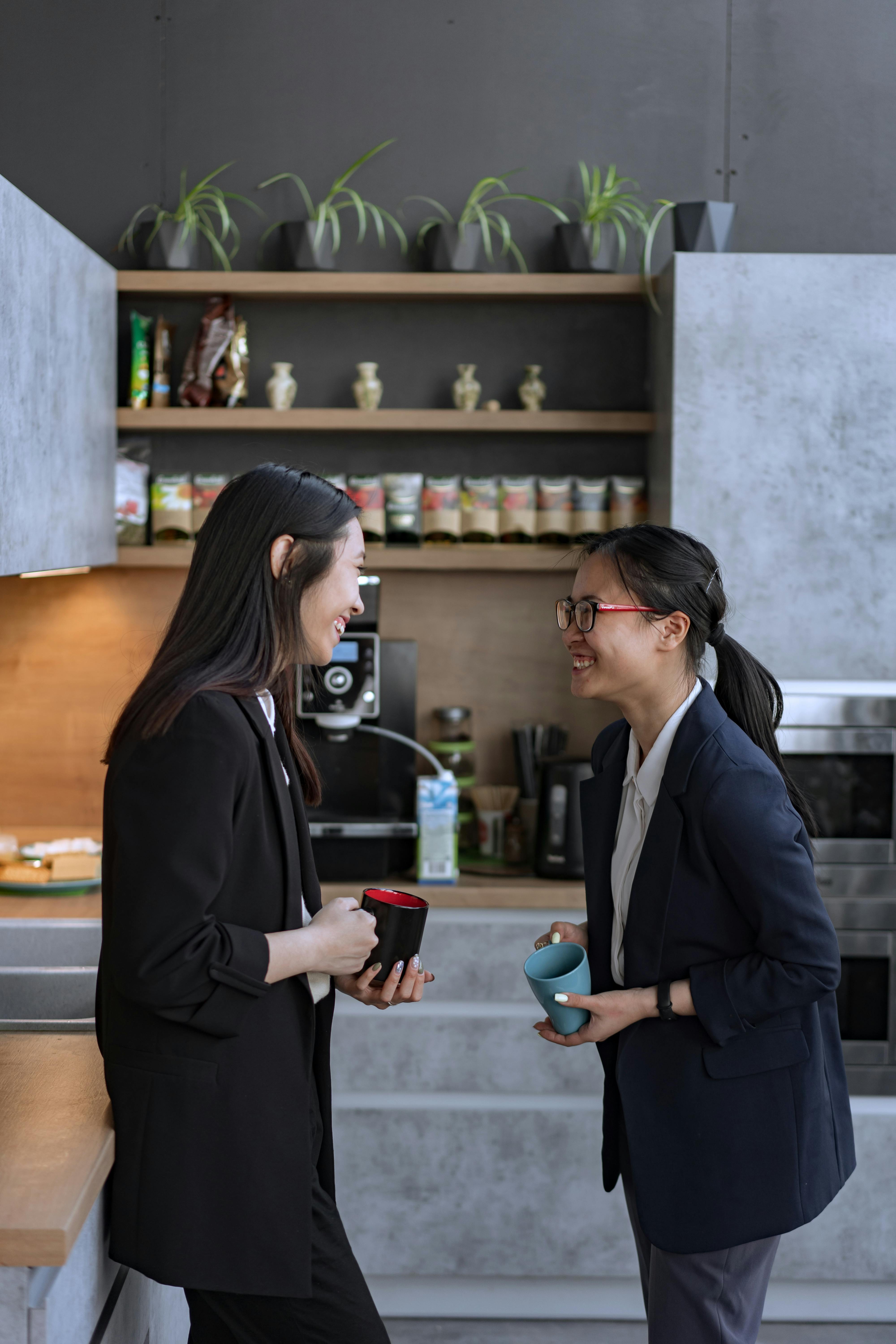 Colleagues talking during a coffee break